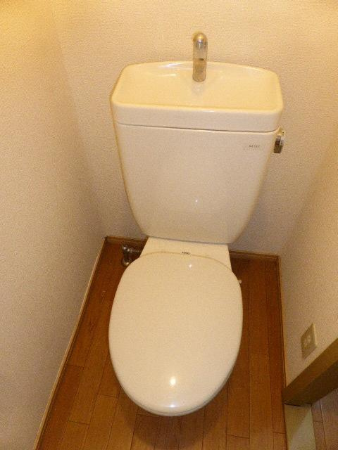 サンライフ京田のトイレ|落ち着いた色調のトイレです