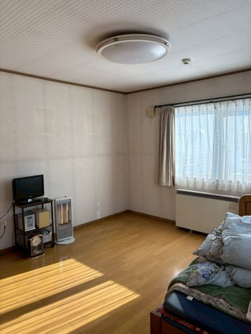 中古住宅（店舗付き）　帯広市東5条南21丁目の洋室