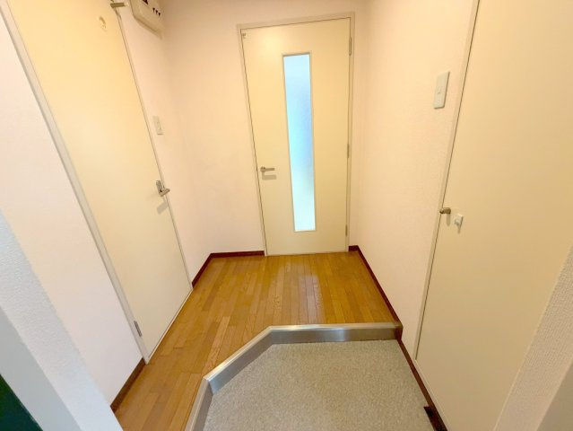 リバーサホ萬の玄関