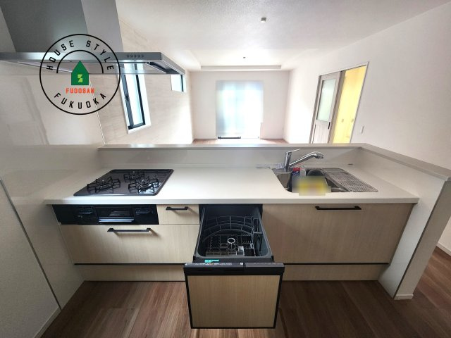 大野城市乙金東1丁目台1-2棟（2号棟）の内観：施工例|ご家族を近くに感じられる対面キッチンのLDK。会話もはずみそうですね。