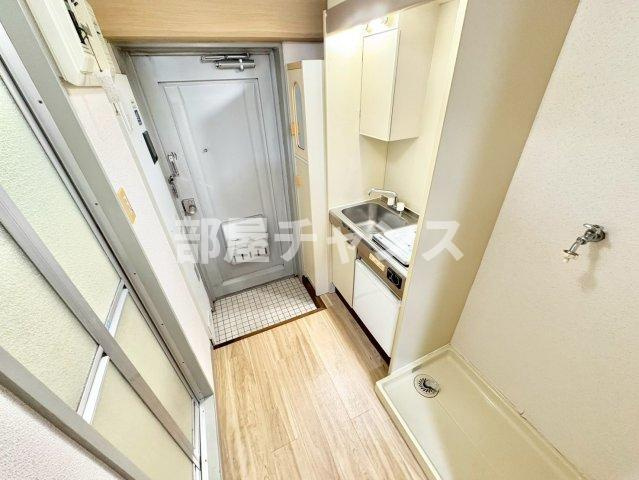 コスモパレスピースワンの玄関