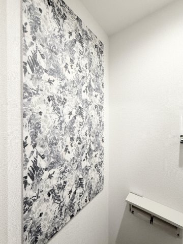 ガナール のトイレ|壁紙のアクセントがカッコよいです