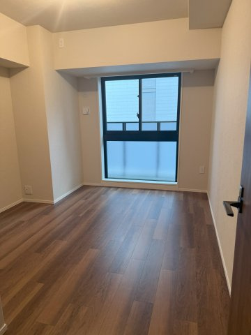 ジオタワー新町の洋室