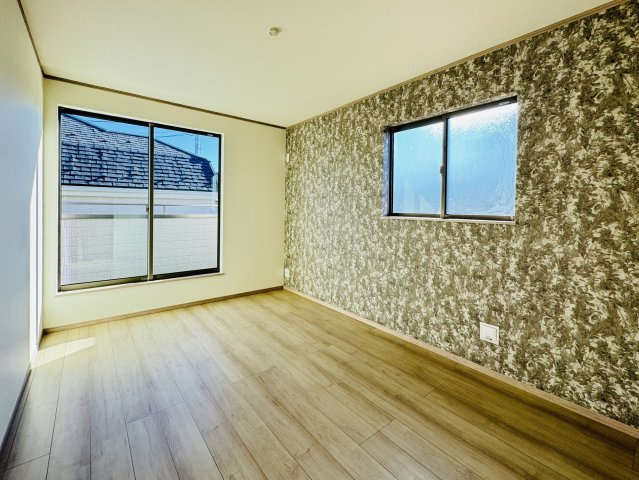 松戸市樋野口新築戸建【中部小学校：10分】の寝室|7帖寝室・アクセントクロス