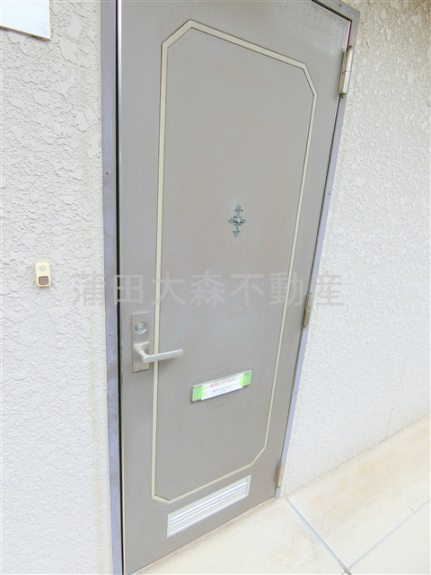 メゾンドルミエールの玄関