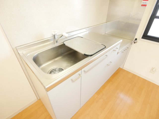 Kハウスのキッチン|コンパクトなキッチンで掃除もラクラク