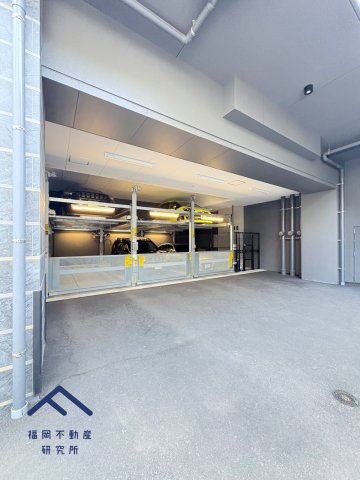  オープンレジデンシア春日原の駐車場