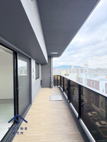  オープンレジデンシア春日原のバルコニー