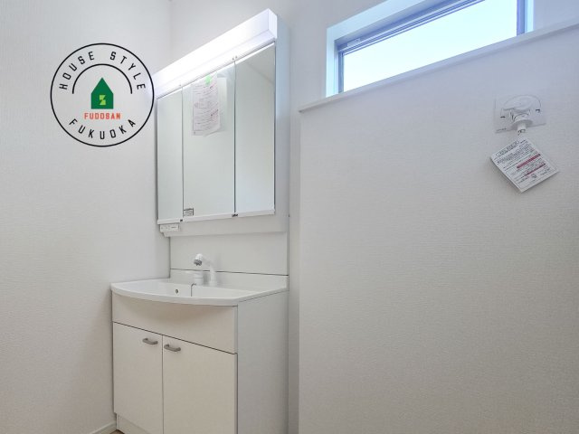 福岡市南区長住7丁目第9-2棟（2号棟）の内観：施工例|洗面所は小さなプライベートスペース。歯磨き、洗顔と毎日施す個人空間。