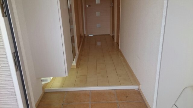 リヴェール栄谷の玄関