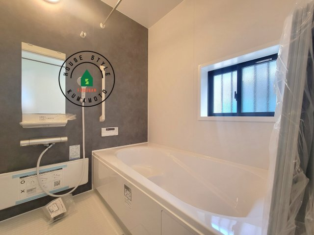 熊本市中央区帯山5丁目第1-1棟（A号棟）の内観：施工例|1日の疲れを癒してくれる広々バスルーム。雨の日のお洗濯にも大活躍な浴室乾燥機付です！