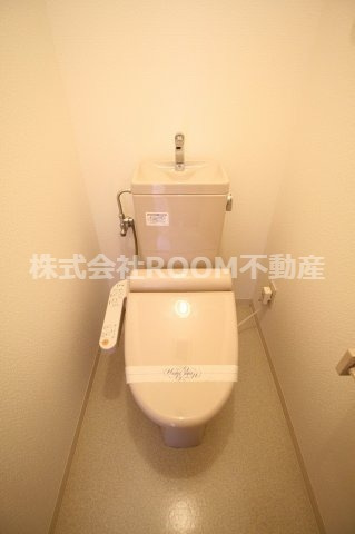 M’ｓ　oneのトイレ|落ち着いた色調のトイレです