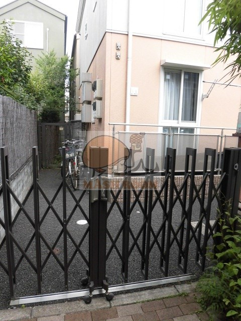 桜コートのエントランス