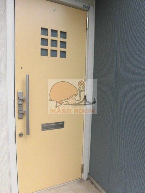 桜コートの玄関