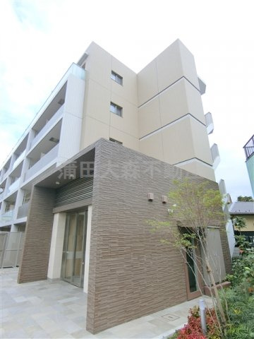 グーフォクォーレの外観|外観タイル張り　2017年11月築　RC鉄筋コンクリート造地上5階建て1K～1LDK総戸数50戸インターネット無料の賃貸マンション　京急本線京急蒲田駅梅屋敷駅徒歩圏内の東京都大田区東蒲田2丁目