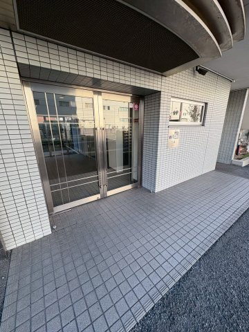 大阪市西区九条３丁目の賃貸マンションのエントランス