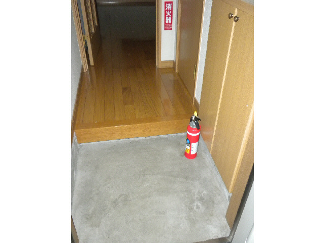 ラ・ポレール啓北の玄関