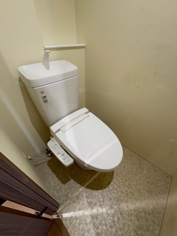 大阪市西区本田１丁目の賃貸マンションのトイレ