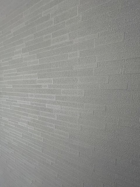 プレサンス天神橋筋六丁目ヴォワールの内装|おしゃれなグレーのクセントクロスが使用されています
