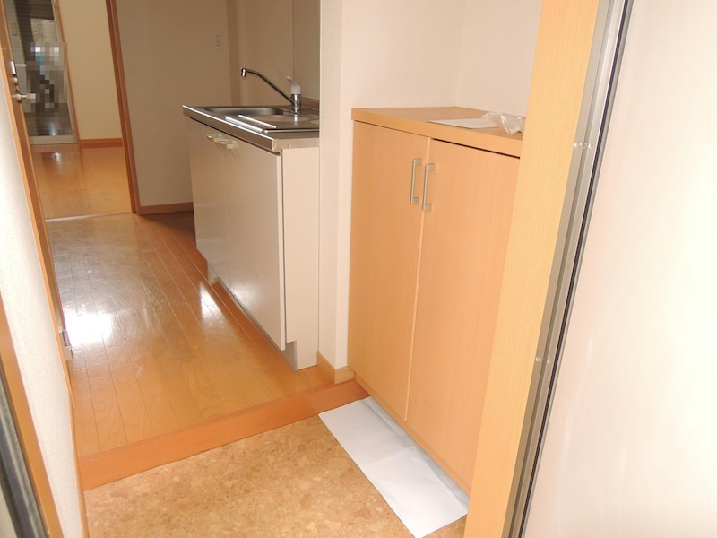 川崎市多摩区菅１丁目のアパートの玄関