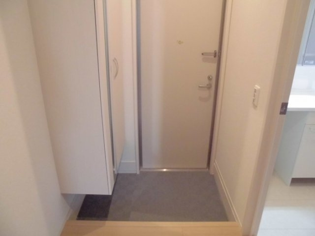 ソレイユＭの玄関