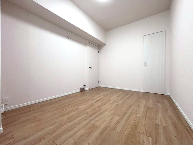 コープ野村月寒西の洋室