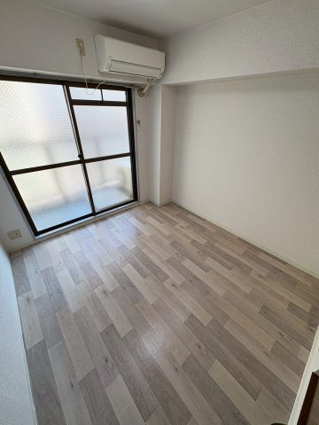 大阪市西区本田４丁目の賃貸マンションの居間・リビング