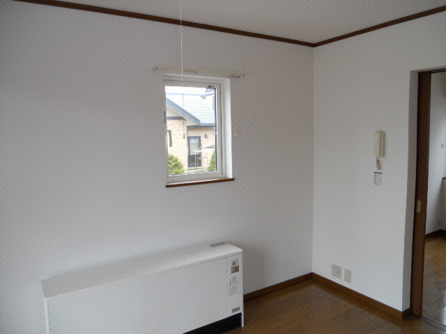 丸松マンションＣの居間・リビング