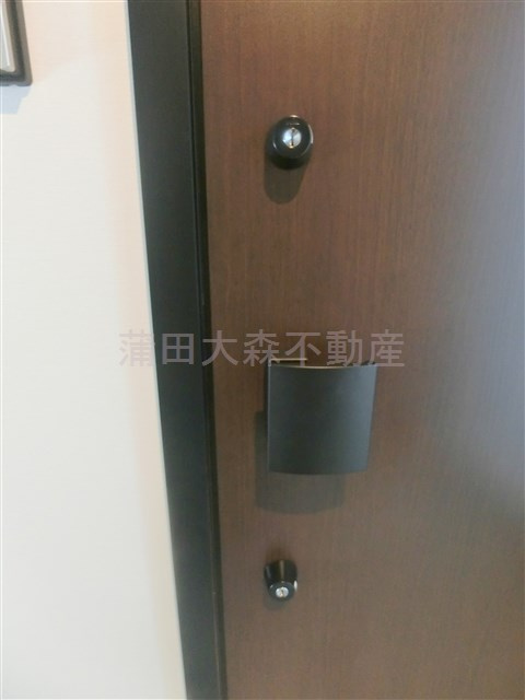 メルヴェーユ久が原Ⅱの玄関