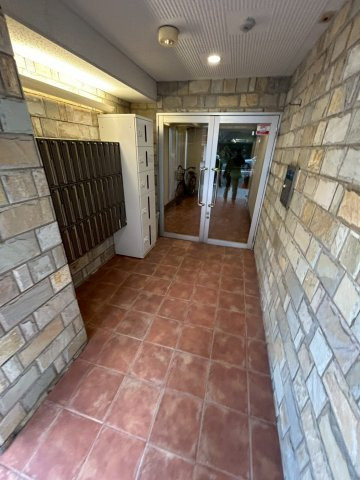 大阪市西区立売堀３丁目の賃貸マンションのエントランス