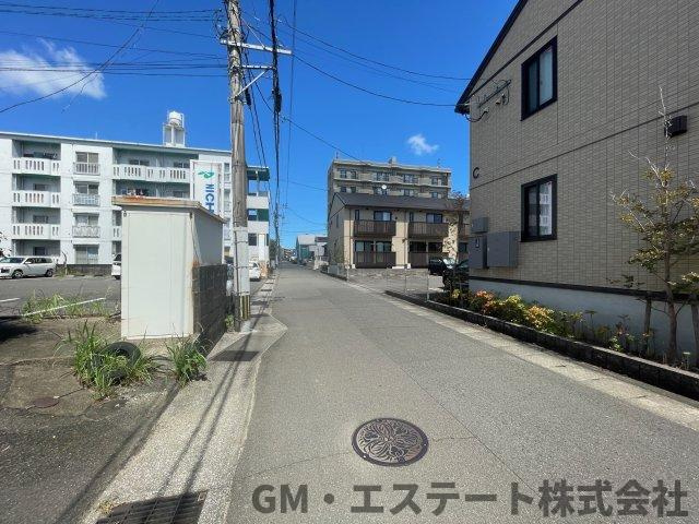 宮崎市大字芳士　土地の前面道路含む現地写真