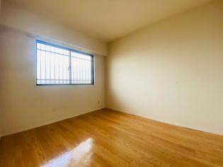 トレスフォンテ東園田の寝室