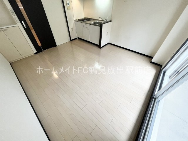 大阪市鶴見区鶴見５丁目の賃貸マンションの居間・リビング