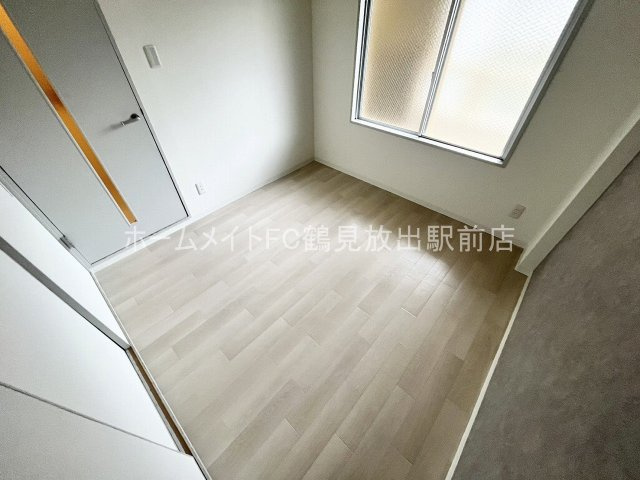 東大阪市稲田上町１丁目の賃貸マンションの洋室