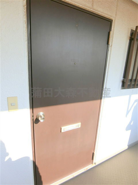 紀陽ハイツの玄関