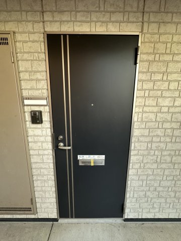 愛コーポレーションカネタの玄関
