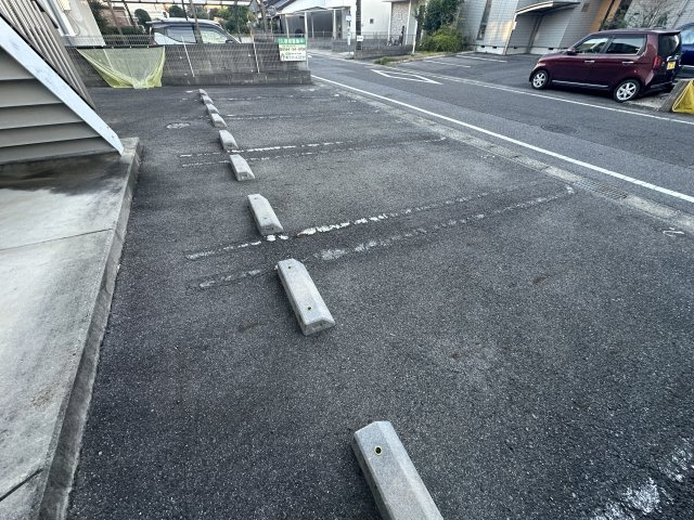 愛コーポレーションカネタの駐車場