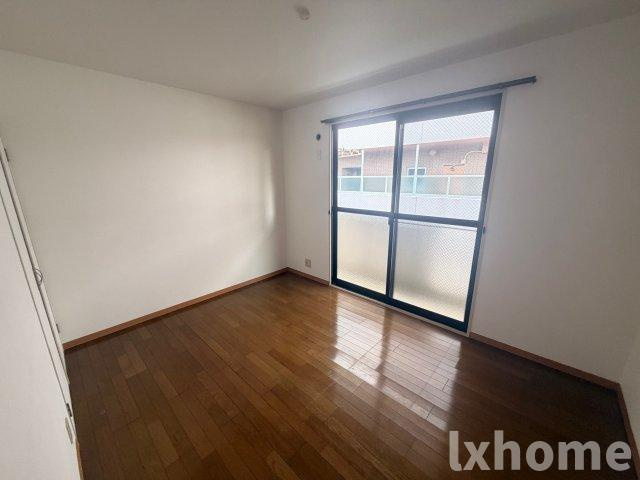 メゾンエルアンドケイの居間・リビング