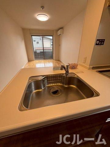 柏崎市松美１丁目のアパートのキッチン