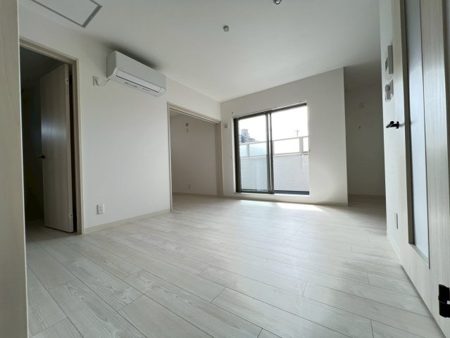 クリエオーレ原町の洋室