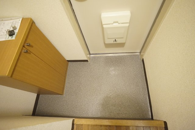 パーシモン東生駒の玄関