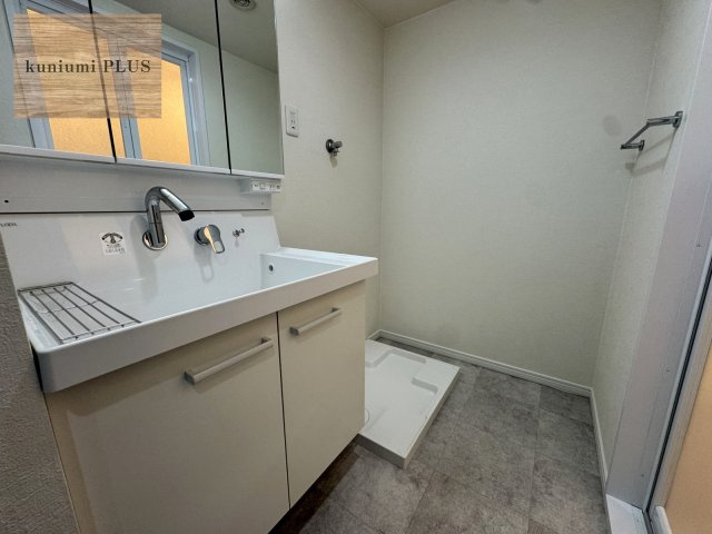 リバーサイドともぶち第1住宅第27号棟の洗面所