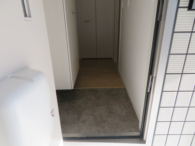 コスモポート新田の玄関