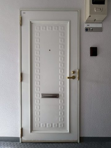 グリーンハイツ麻生(考友第6ビル)の玄関