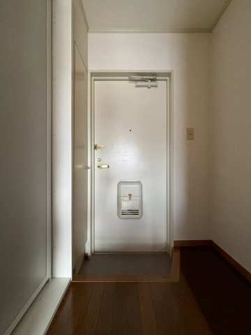 グリーンハイツ麻生(考友第6ビル)の玄関