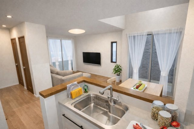 山田出口町の完成予想図|【リビングイメージパース】
正面に遮るものがない対面キッチン。キッチンワークをしながらお子様の様子も確認できる忙しいパパママに嬉しい配置です。