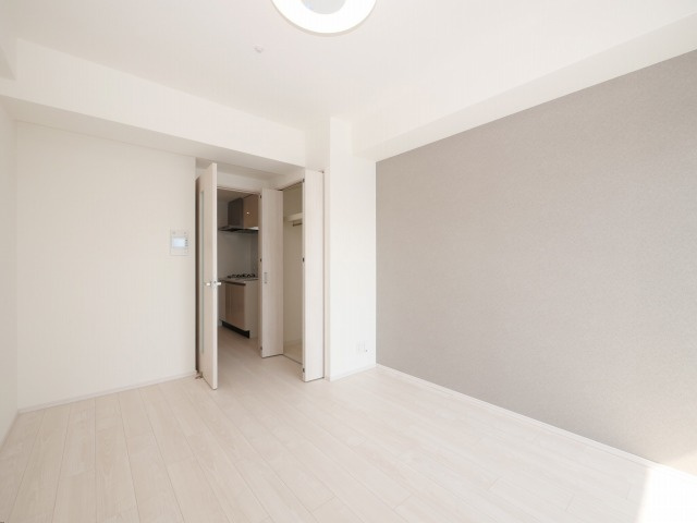 ソルテラスＯＳＡＫＡ　ＥＡＳＴ　ＧＡＴＥの居間・リビング