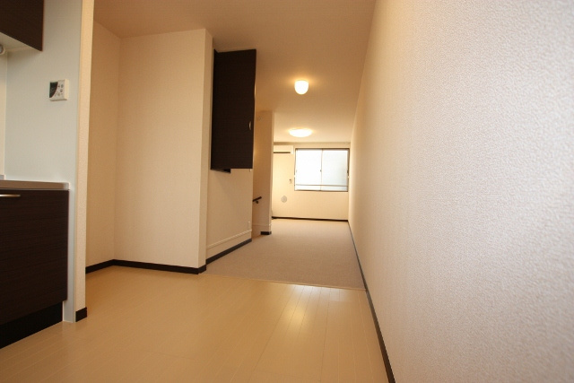 レオネクストＳＵＮＦＬＯＷＥＲの居間・リビング