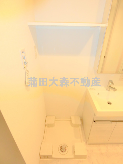 プレール・ドゥーク大森町の設備|棚付きの洗濯機置き場