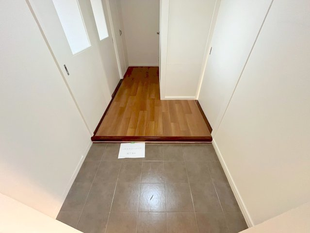 フラワリータウン生駒Aの玄関